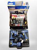 A Powercraft four piece cordless drill set and a further box of angle grinder, spirit level,