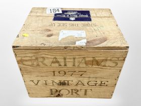 Twelve bottles of 1977 Graham's Vintage port, sealed in crate.