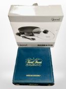A Gourmet by Keenox hotplate in box together with a boxed Trivial pursuit game