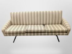 A 1970's Danish three seater settee in striped upholstery on chrome legs, length 187 cm,