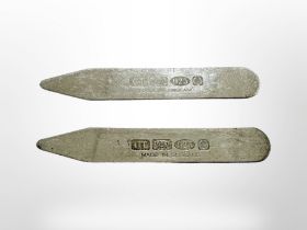 A pair of silver collar stiffeners, length 62mm.