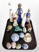 A group of Spanish figures, Wade tortoise, polished stone egg ornaments,