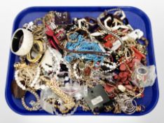 A tray of costume jewellery, beaded necklaces,
