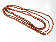 A long graduated coral necklace