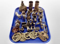 A collection of brass wares, horse brasses, bottle opener, figures,