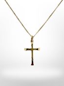 A 9ct yellow gold necklace with yellow metal crucifix pendant.