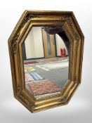 A 19th century octagonal gilded mirror,