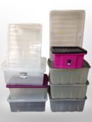 A group of plastic storage boxes,
