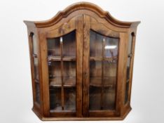 A Scandinavian stained beech glazed wall cabinet,