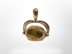 A 9ct yellow gold swivel fob set with hardstones CONDITION REPORT: 6.