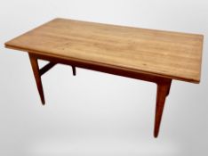 A 1970's Danish extending coffee table,