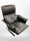 A Danish black leather and chrome armchair CONDITION REPORT: seat has several tears