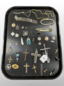 A group of costume jewellery, crucifix pendants,