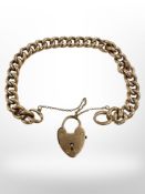 A 10ct hollow link bracelet with padlock clasp, approximate length 16 cm.