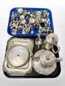Two trays of antique and later silver plated items, various cutlery, hot water jug and teapot,