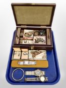 A jewellery box and contents, costume jewellery, brooches,
