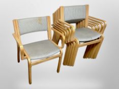 A set of six 20th century Danish laminated beech stacking chairs in striped upholstery