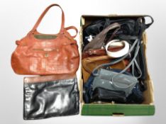 A box of lady's leather hand bags,