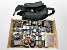 A box of cameras and accessories, Chinon, NIkon, Canon,