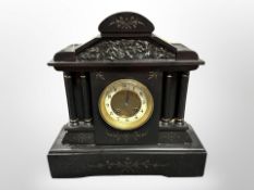 A Victorian black slate and marble eight day mantle clock,