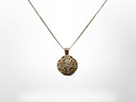 A 9ct yellow gold necklace with diamond set pendant, 47 cm. CONDITION REPORT: 2.7g.
