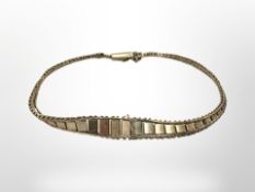 A 9ct tri-coloured gold bracelet, length 20 cm. CONDITION REPORT: 5.