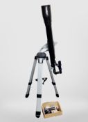A Telestar by Meade telescope on tripod and further box of several lenses