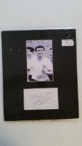 FOOTBALL, signed white card by Bobby Smith, overmounted in black beneath half-length photo showing