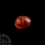 Etruscan Red Carnelian Scaraboid with Archery Intaglio