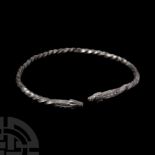 Viking Age Silver Twisted Bracelet with Animal Head Terminals