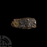 Anglo-Saxon Bronze Strap End with Rivetted Silver Plate with Beast Facing Back