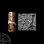 Early Neo-Assyrian Banded Agate Cylinder Seal with Combat Scene