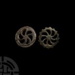 Roman Bronze Sun Whorl Brooch Group