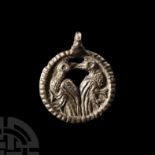 Viking Age Silver Pendant with Huginn and Muninn