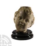 Life-Size Limestone Head of a Cherub