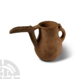 Luristan Bird-Spouted Terracotta Vessel with Animal Handle