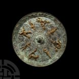 Chinese Tang Style Gilt Bronze Mirror with Erotic Scenes