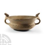 Western Asiatic Double-Handled Terracotta Drinking Vessel