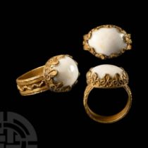 Gold Ring with Chalcedony Cabochon