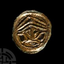 Anglo-Saxon Gilt Chip-Carved Button Brooch with Helmetted Warrior