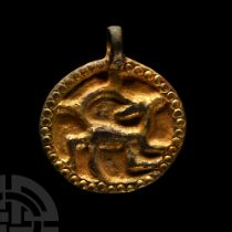 Viking Age Silver-Gilt Pendant with Beast Facing Back