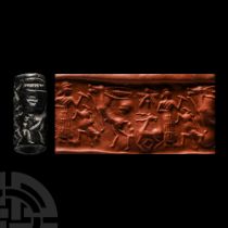 Western Asiatic Black Stone Cylinder Seal with Figural Combat Scene