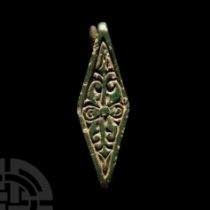 Anglo-Saxon Gilt Chip-Carved Bronze Lozengiform Brooch