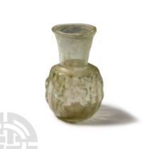 Roman Pinch-Decorated Glass Bottle