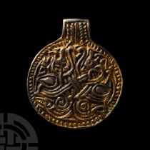 Large Viking Age Silver-Gilt Pendant with Entwined Beasts