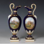 A pair of Minton Kedleston ewers, 1890s, painted by J.E. Dean, signed, with titled oval panels of