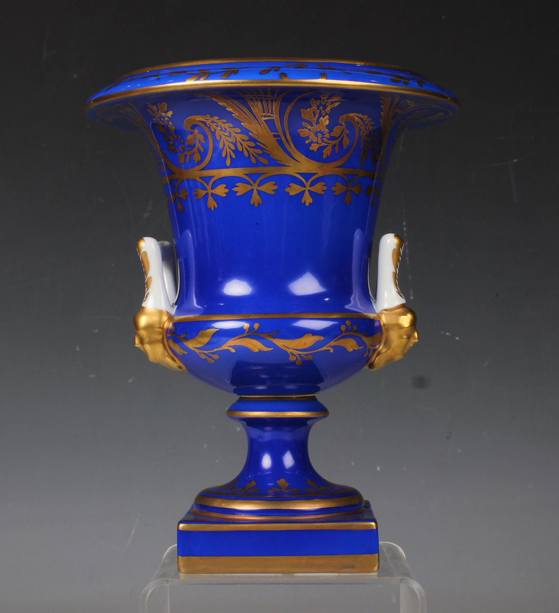 A small group of Continental porcelain, 20th century, comprising a Dresden blue ground urn, height - Image 9 of 12