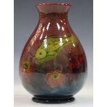 A Moorcroft flambé baluster vase, 1920s, decorated with the Fish design, impressed Cobridge