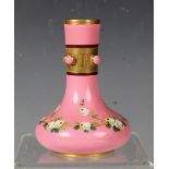 A Mintons pottery pink glazed small bottle vase, late 19th century, designed by Christopher Dresser,