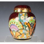 A Carlton Ware Art Deco Egyptian Fan pattern ginger jar and cover with mottled red ground, black
